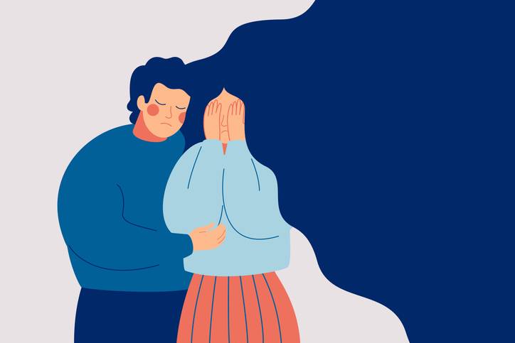 Illustration showing two grieving parents embracing