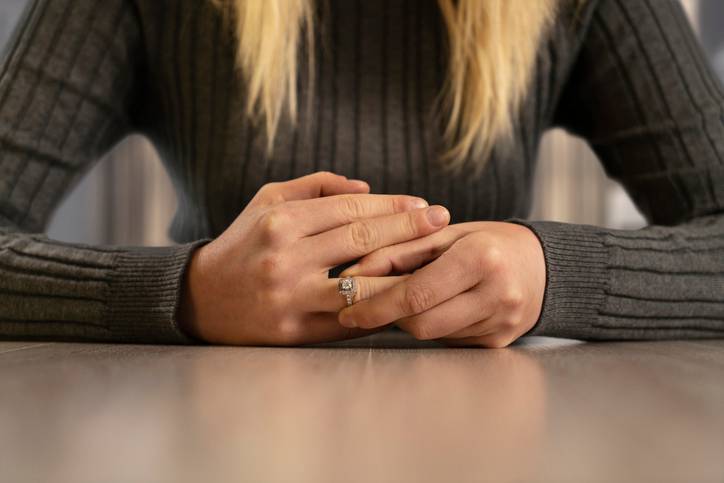woman holding her ring