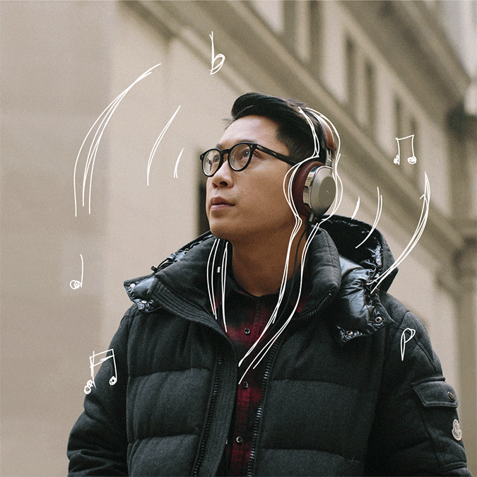 Man listening to music through headphones
