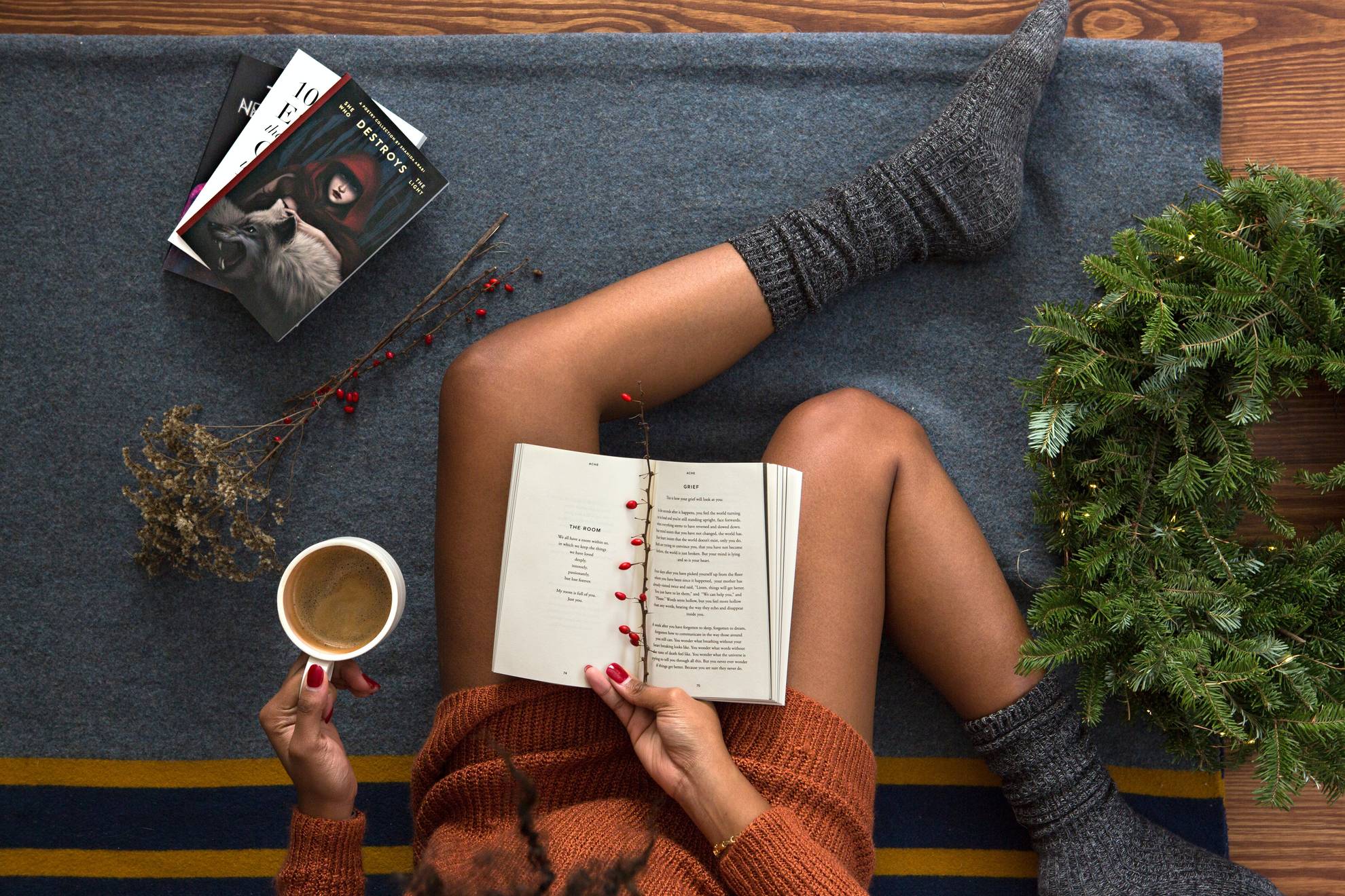 a girl reading during Christmas alone