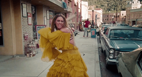 Beyonce smashes a car window with a baseball bat in the video for Hold Up