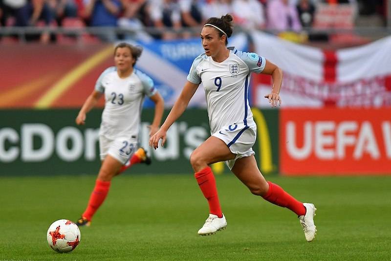 Woman football player about to kick football in Women's Euros Scotland versus England game in 2017