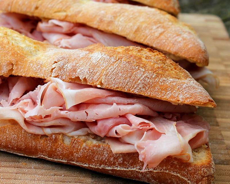 Jambon beurre sandwich made out of baguette stuffed with ham