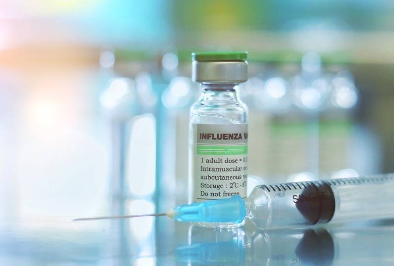 Flu vaccine and needle