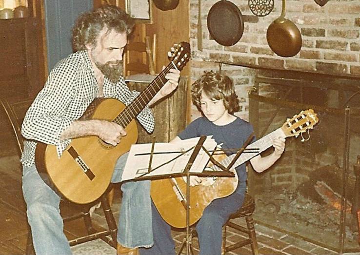 Lavinia Spalding playing flamenco guitar with her father