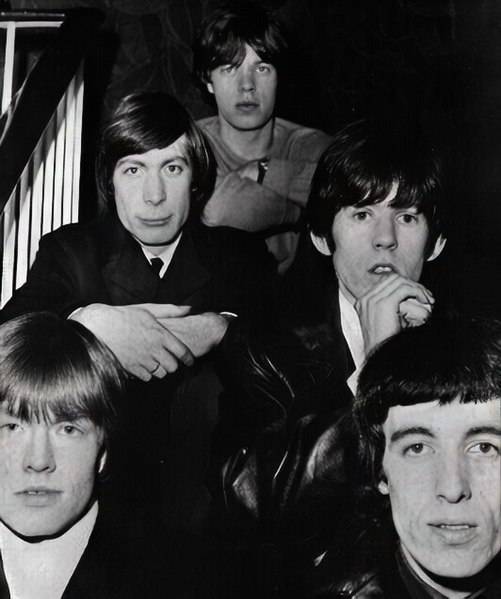 Group photographs of the Rolling Stones taken from a 1965 Billboard trade ad. From up to down: Mick Jagger; Charlie Watts and Keith Richards; Brian Jones and Bill Wyman.