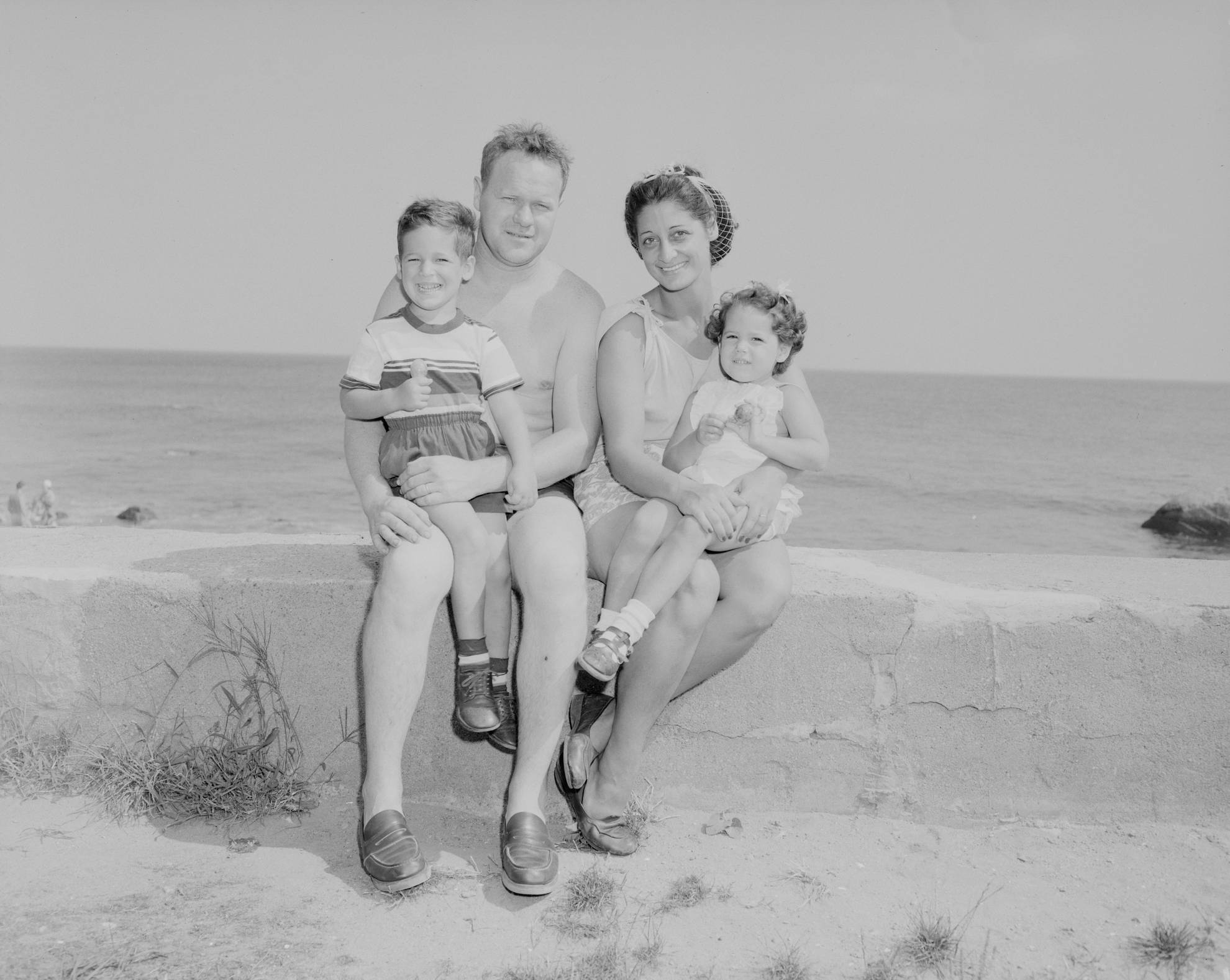 black and white photo of a family