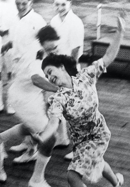 Princess Elizabeth playing tag with Navy officers en route to South Africa with her parents and sister in early 1947