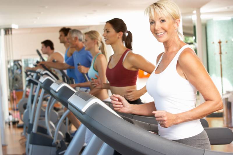 Fitness tips an image showing group of people on treadmills