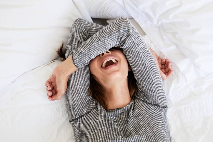 laughing in bed