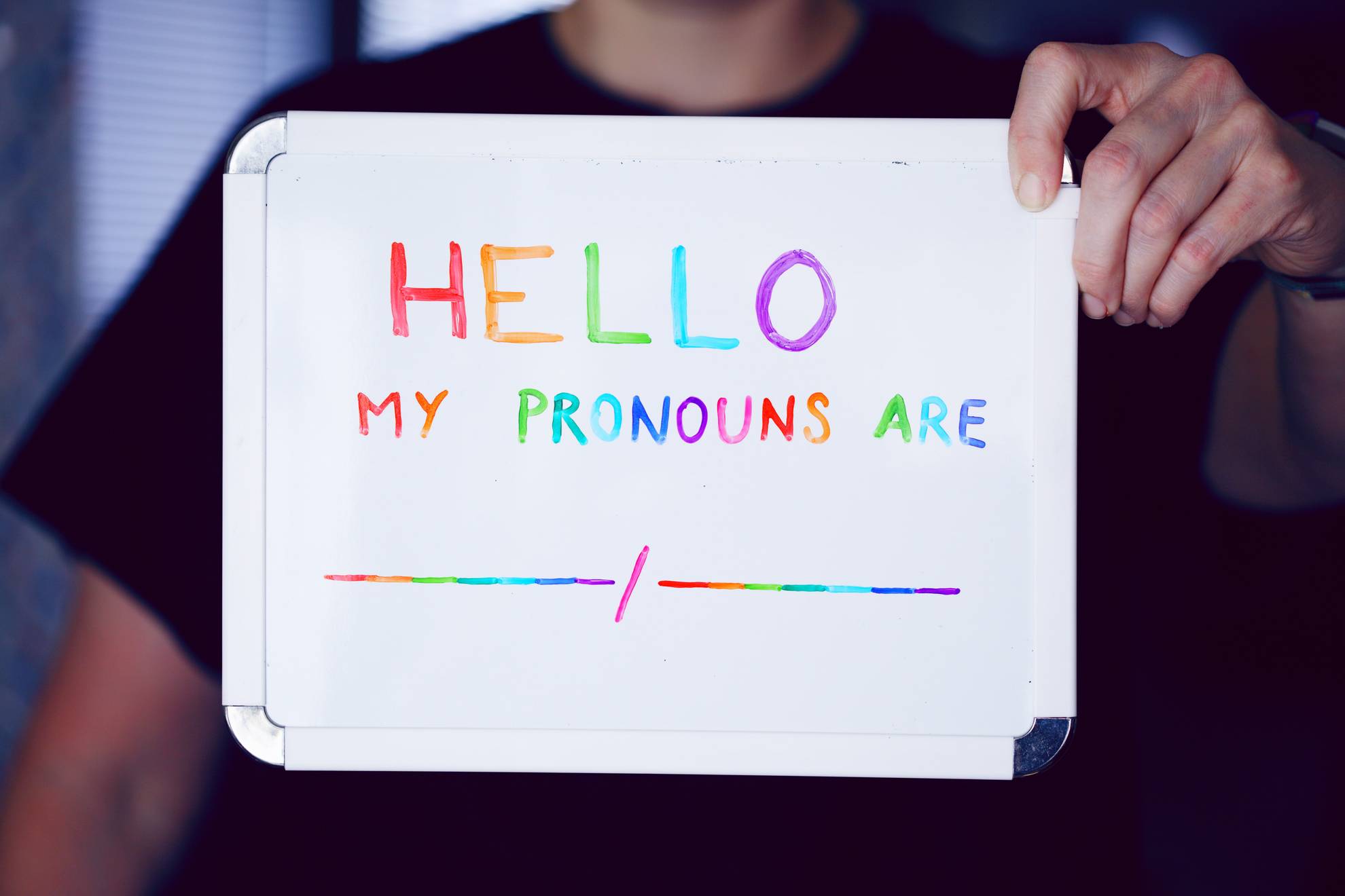 whiteboard holding pronouns