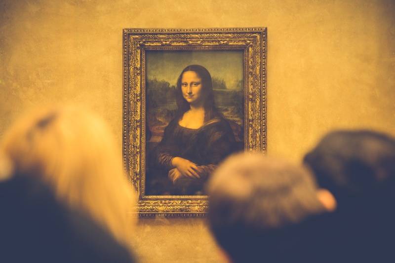 Da Vinci's Mona Lisa hanging in the Louvre