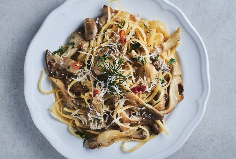 Oyster mushrooms on tagliatelle pastry with parmesan