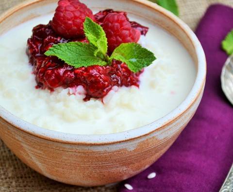 Clotted cream rice pudding with raspberry compote