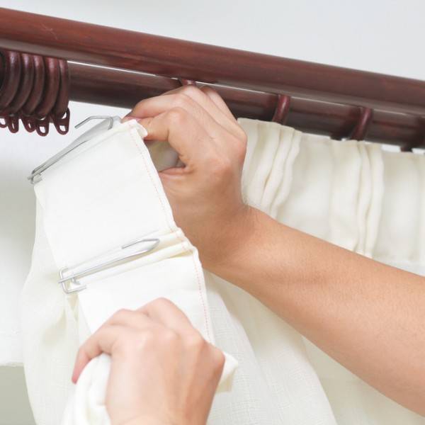 How to put up a curtain track or pole - Reader's Digest