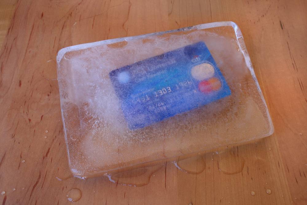 frozen credit card in ice debt tips