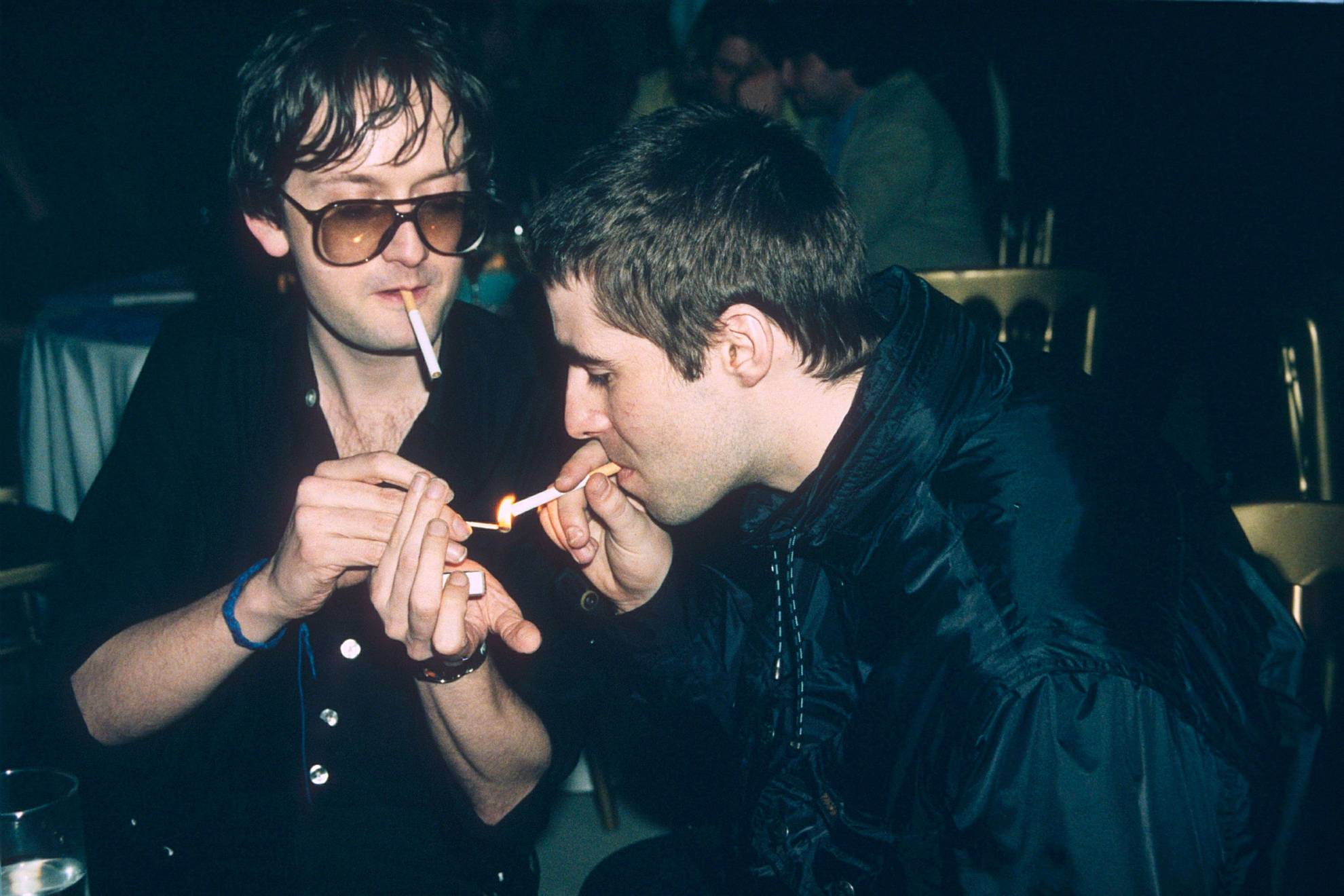 Cocker and Noel Gallagher smoking together
