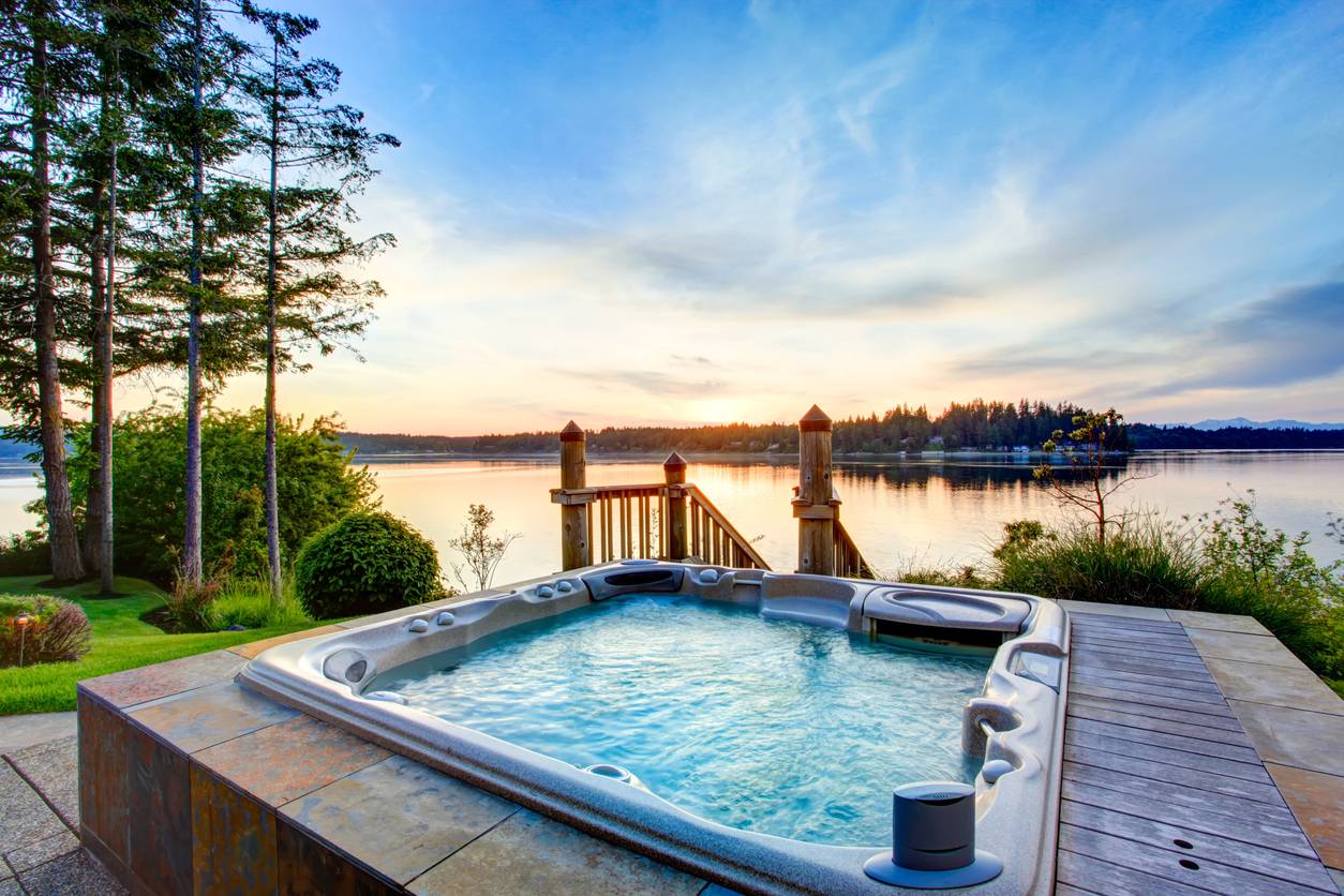 Hot tub next to a lake