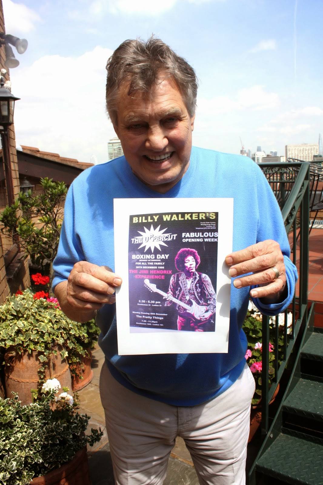Ex -co owner of the Upper Cut club Billy Walker holding a poster promoting Jimi Hendrix flyer