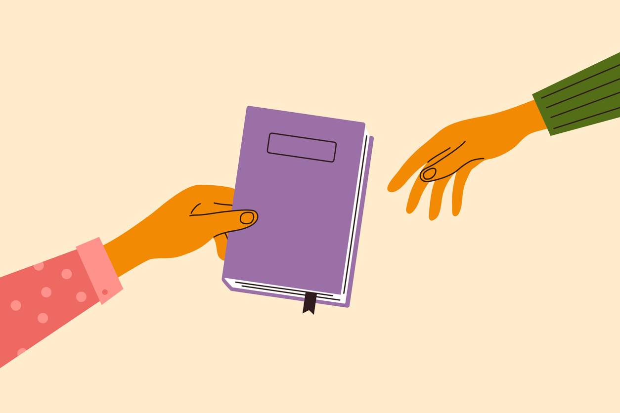 Illustration of a hand passing a book to another outstretched hand
