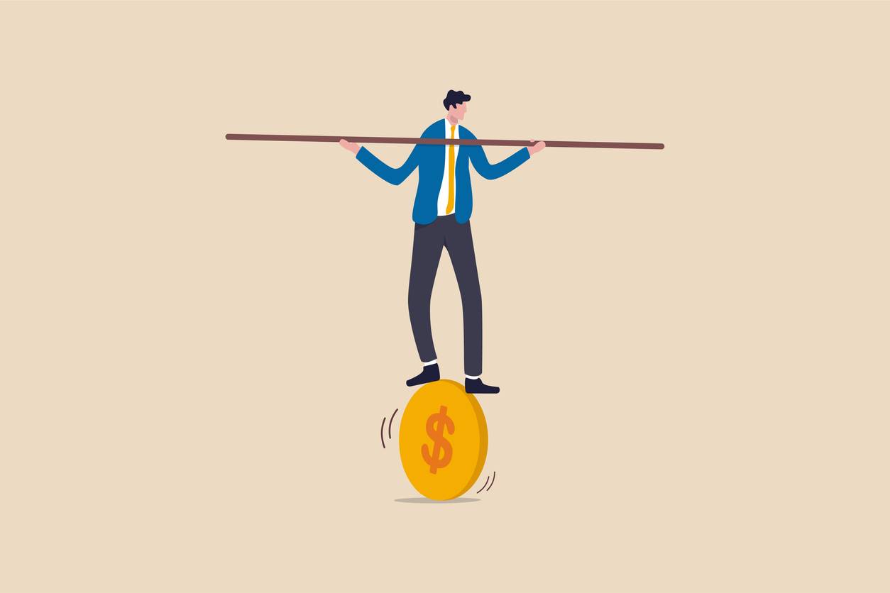 Illustration of man balancing on coin