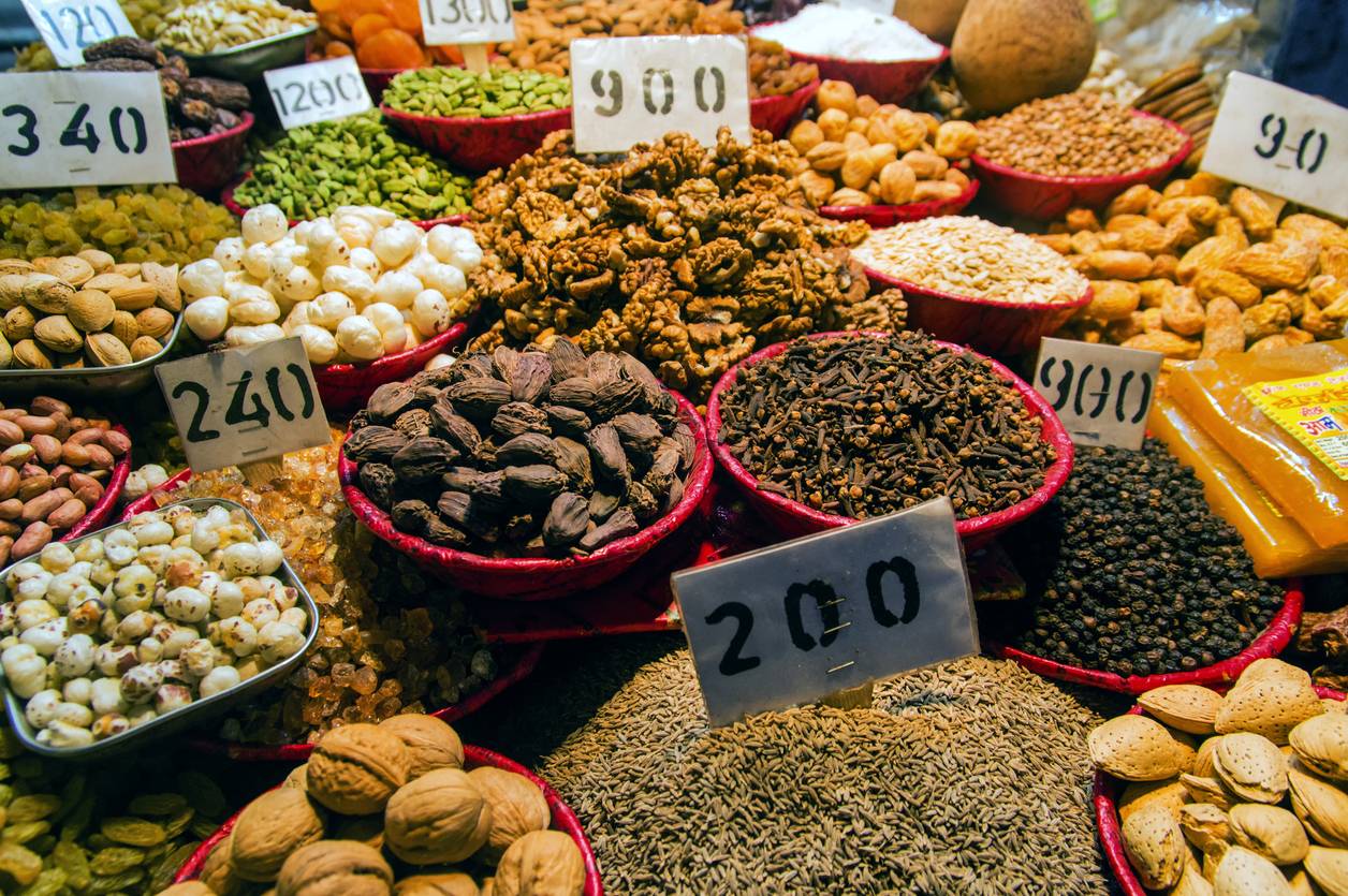 Indian spices and dried fruits at a market stall