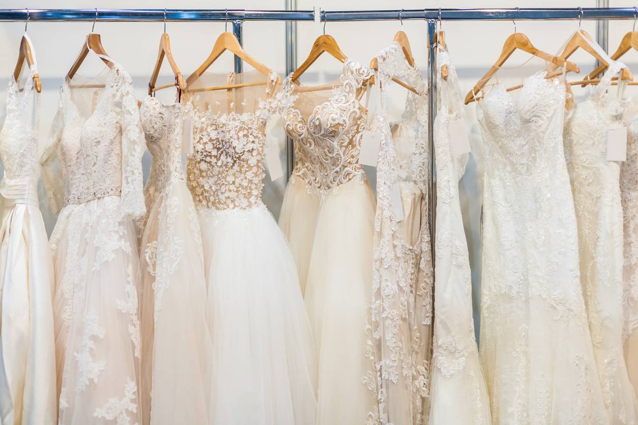 a row of wedding dresses